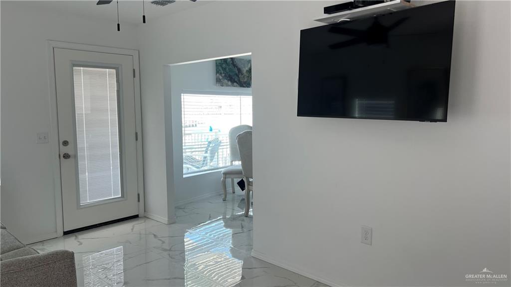 318 Sun Dial Circle Port Isabel, TX 78578 - Photo 10 of 19 a bathroom with a shower and a toilet