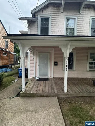 front view of a house with a street