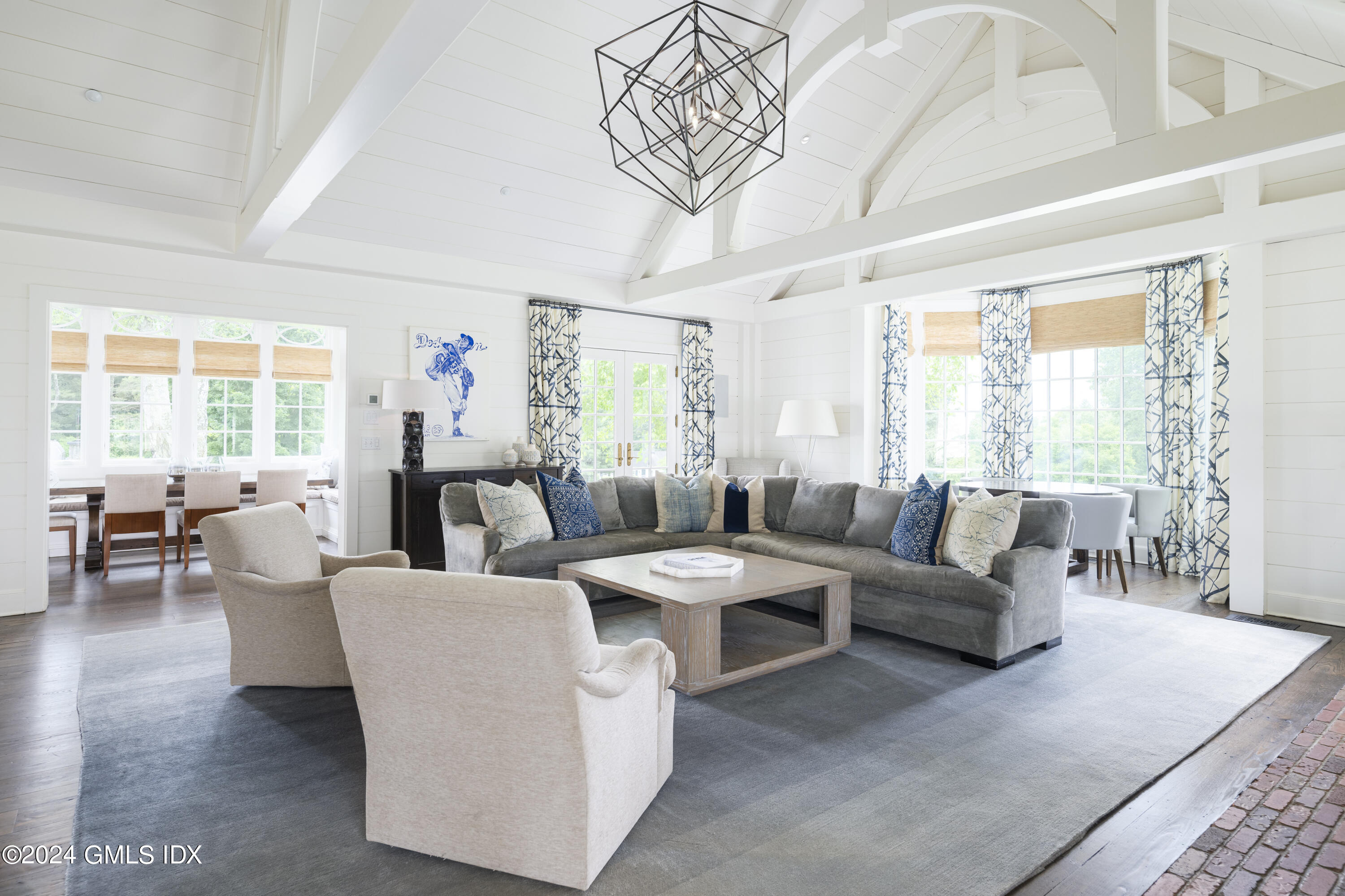 865 Hollow Tree Ridge Road Darien, CT 06820 - Photo 13 of 37 a living room with furniture and a large window