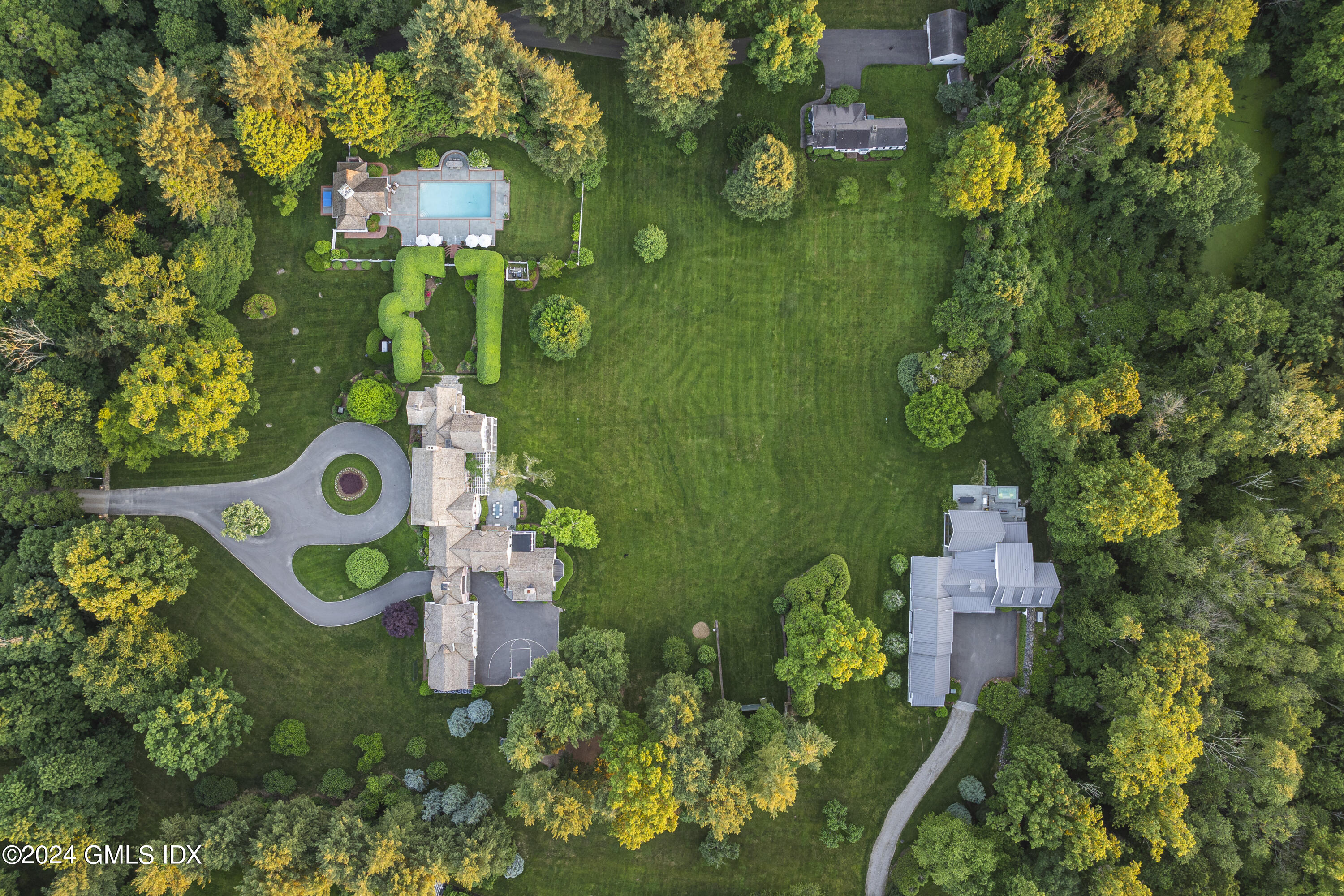 865 Hollow Tree Ridge Road Darien, CT 06820 - Photo 37 of 37 an aerial view of a house
