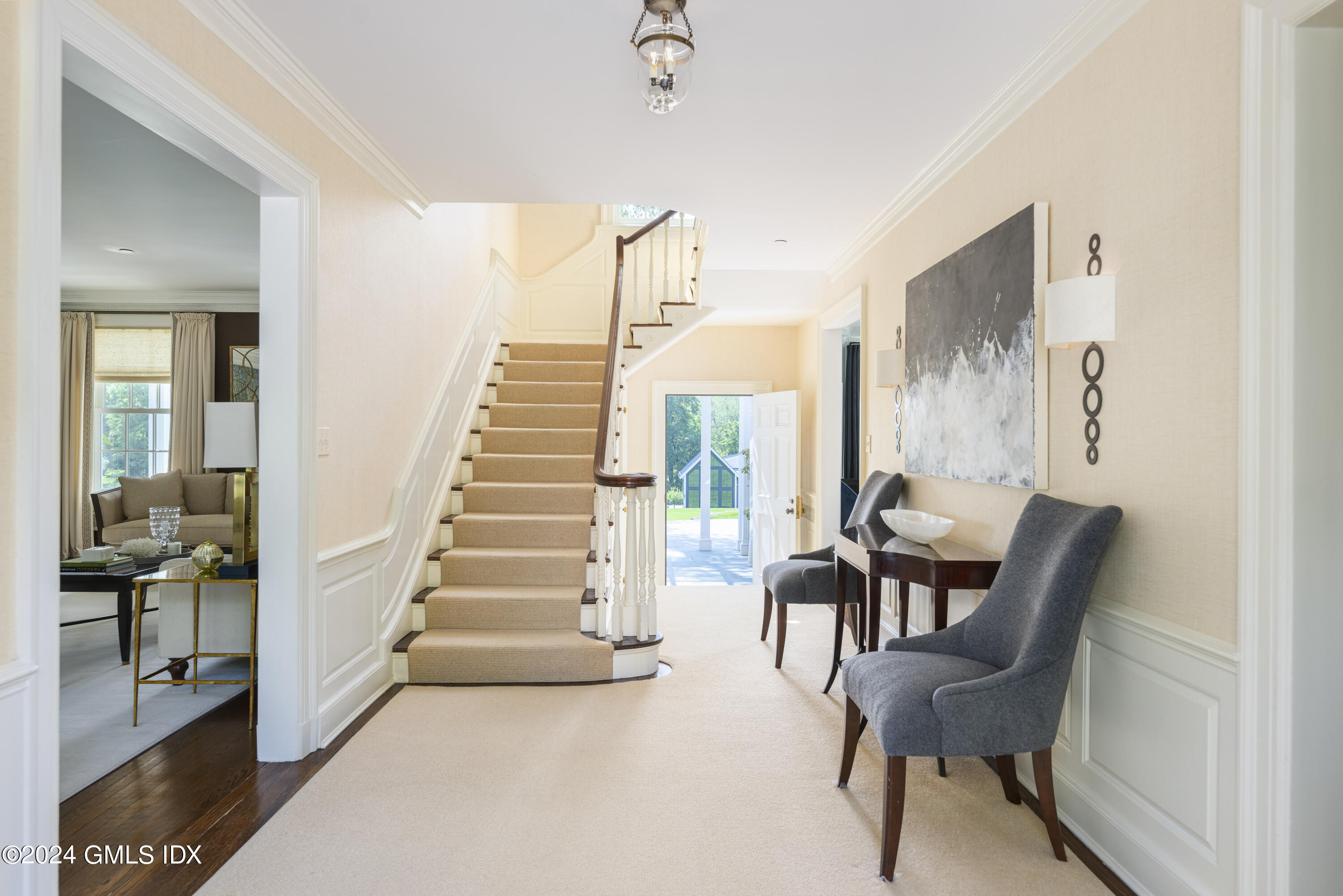 865 Hollow Tree Ridge Road Darien, CT 06820 - Photo 4 of 37 a view of entryway and hall with wooden floor