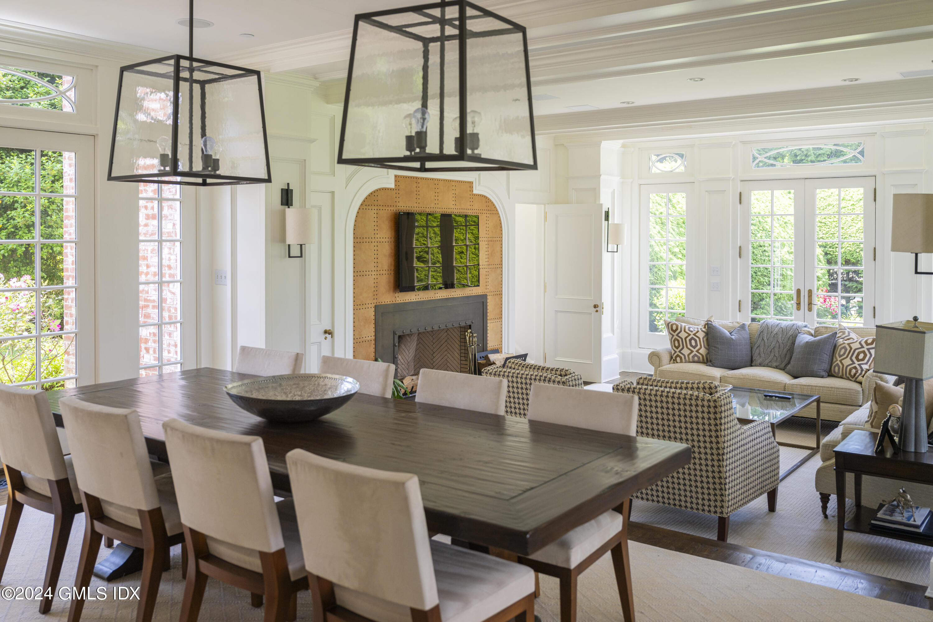 865 Hollow Tree Ridge Road Darien, CT 06820 - Photo 6 of 37 a view of a dining room with furniture window and outside view