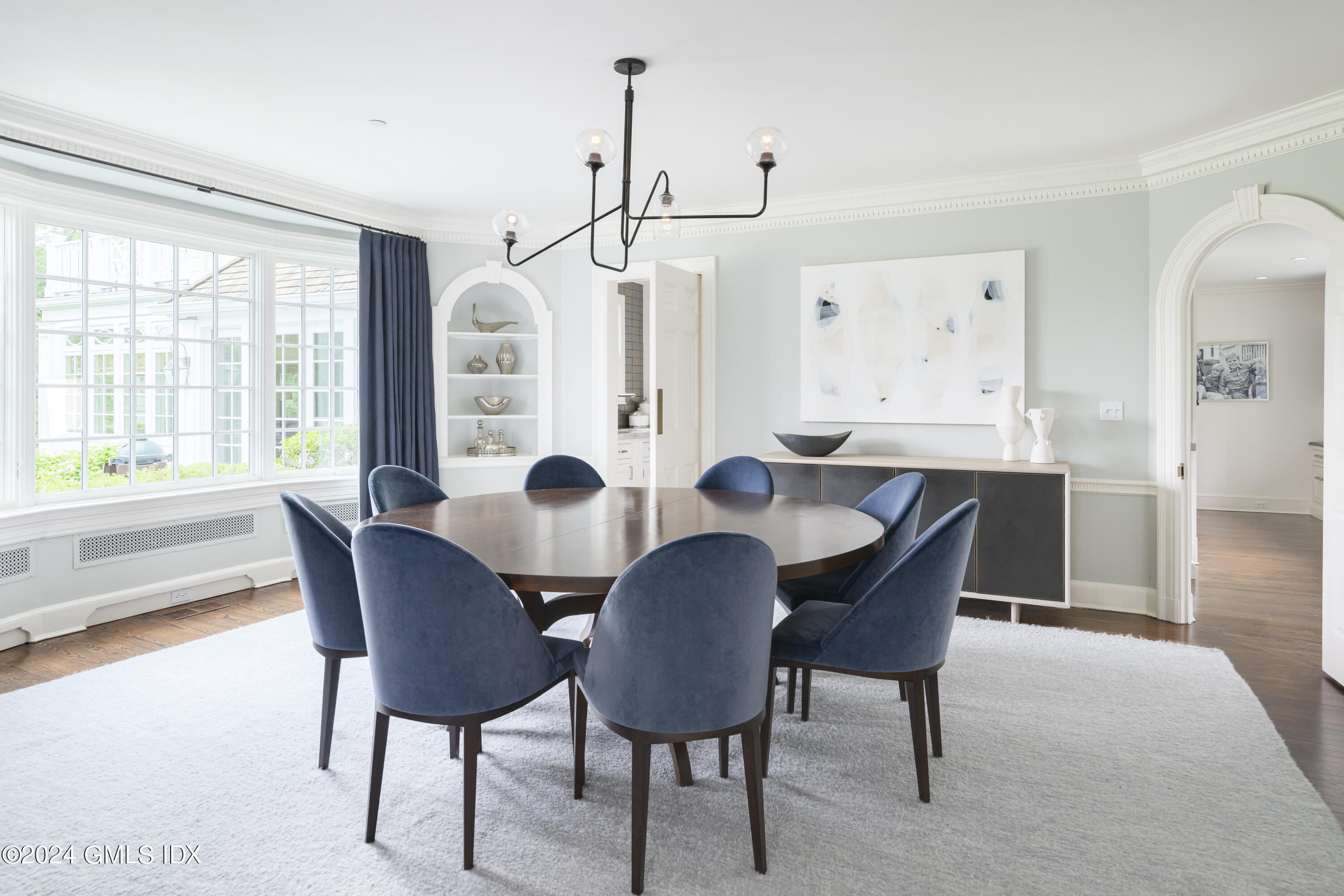 865 Hollow Tree Ridge Road Darien, CT 06820 - Photo 8 of 37 a view of a a dining room with furniture window and wooden floor
