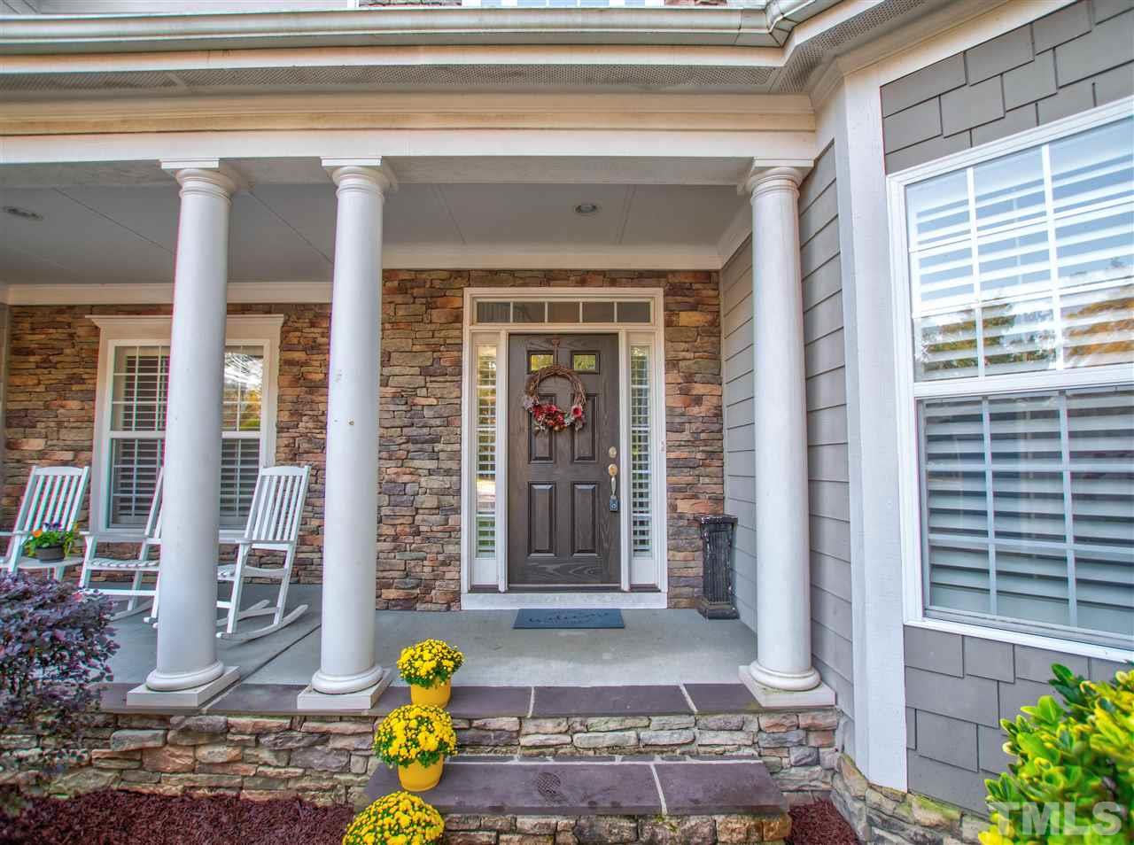 4307 Oakthorne Way Raleigh, NC 27613 - Photo 2 of 30 a front view of a house with outdoor seating