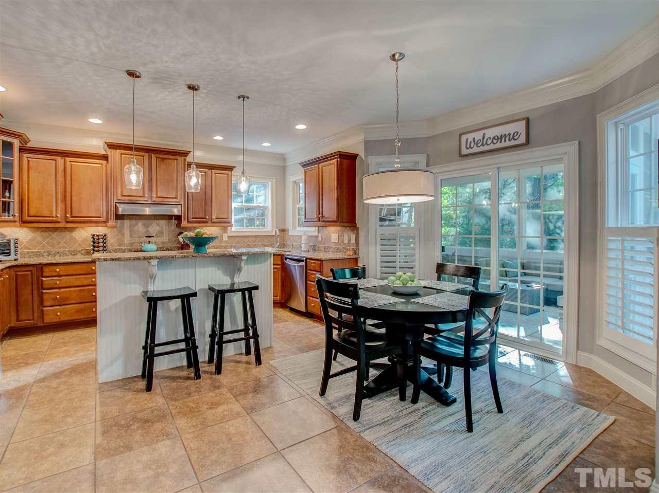 4307 Oakthorne Way Raleigh, NC 27613 - Photo 11 of 30 a view of a dining room and livingroom