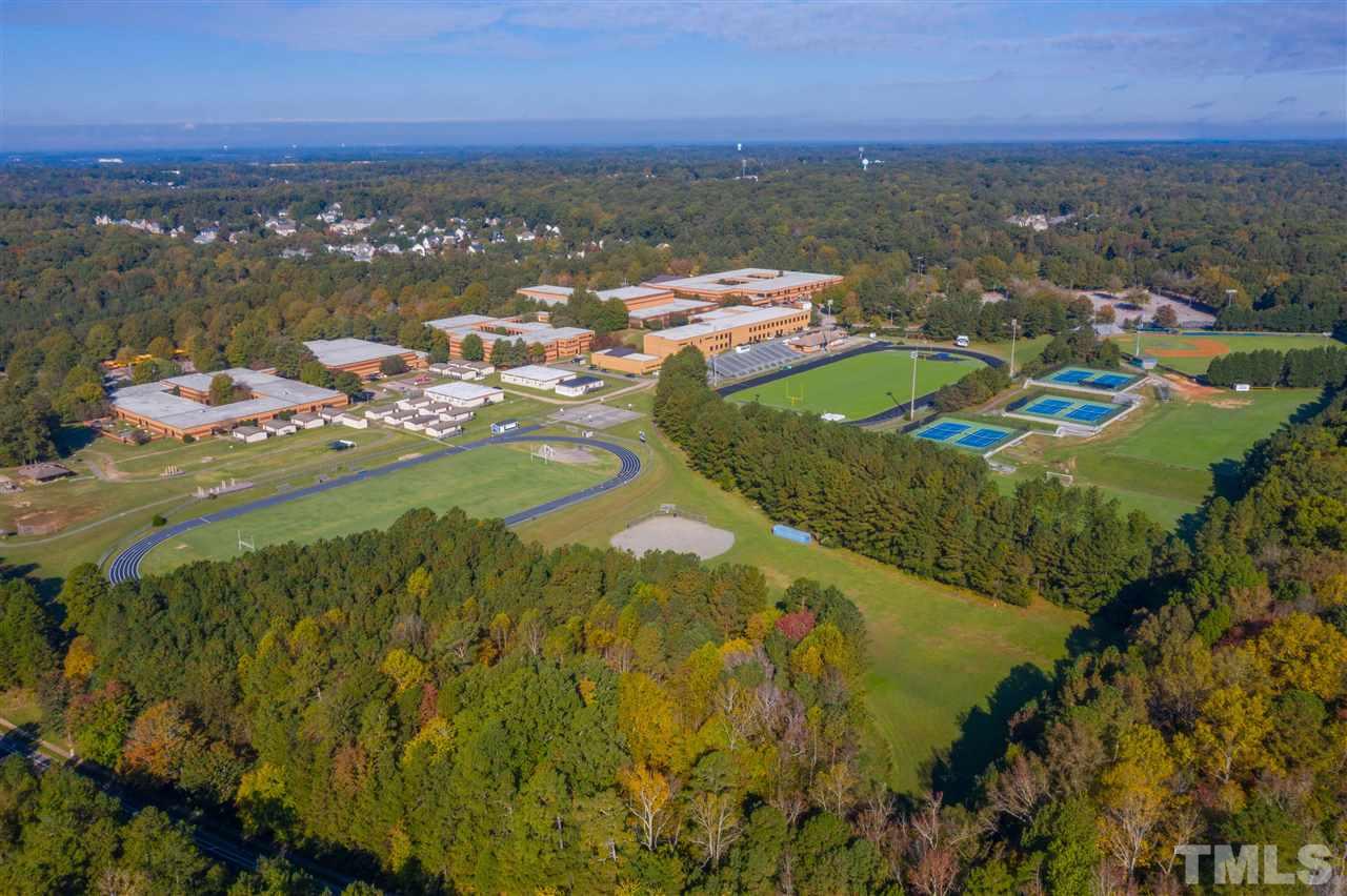 4307 Oakthorne Way Raleigh, NC 27613 - Photo 30 of 30 a view of a lake with a city