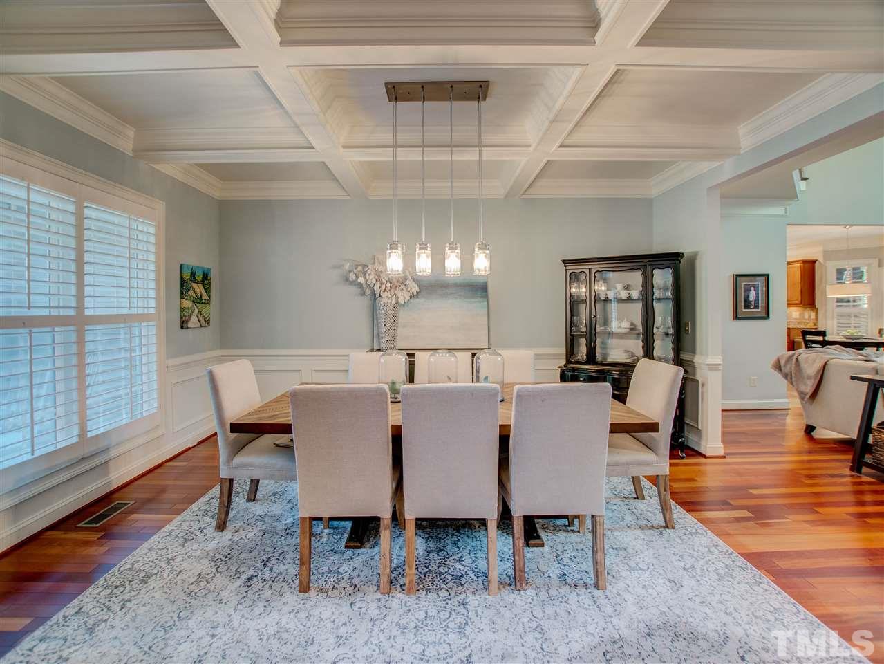 4307 Oakthorne Way Raleigh, NC 27613 - Photo 4 of 30 a view of a dining room with furniture and wooden floor