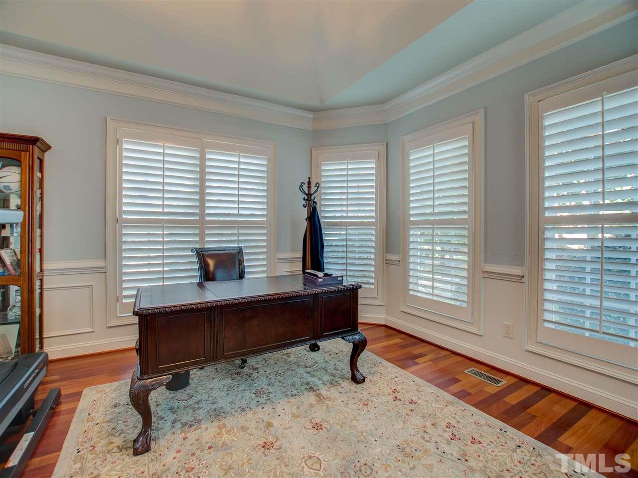 4307 Oakthorne Way Raleigh, NC 27613 - Photo 6 of 30 a view of a workspace with a window and chair