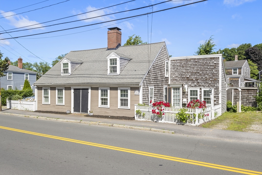 191-193 South Street, Unit 1 Hingham, MA 02043 - Photo 1 of 23 front view of a house with a porch