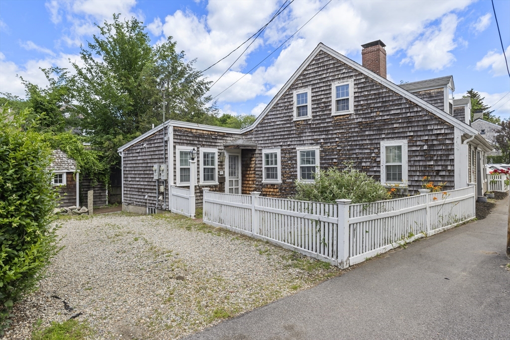 191-193 South Street, Unit 1 Hingham, MA 02043 - Photo 21 of 23 a front view of a house with a porch