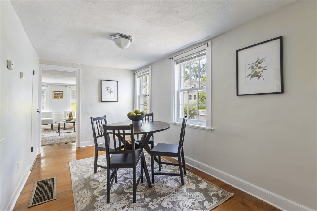 191-193 South Street, Unit 1 Hingham, MA 02043 - Photo 5 of 23 a view of a dining room with furniture and a window