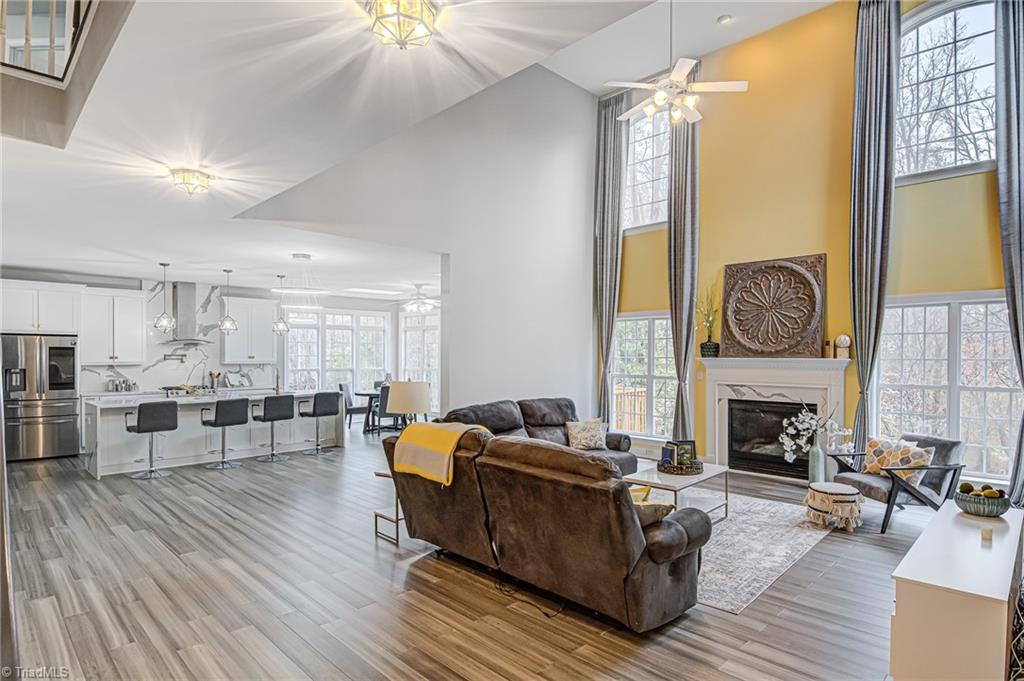706 Number Ten Way Oak Ridge, NC 27310 - Photo 8 of 34 This picture captures the flow of the open floor plan beautifully!