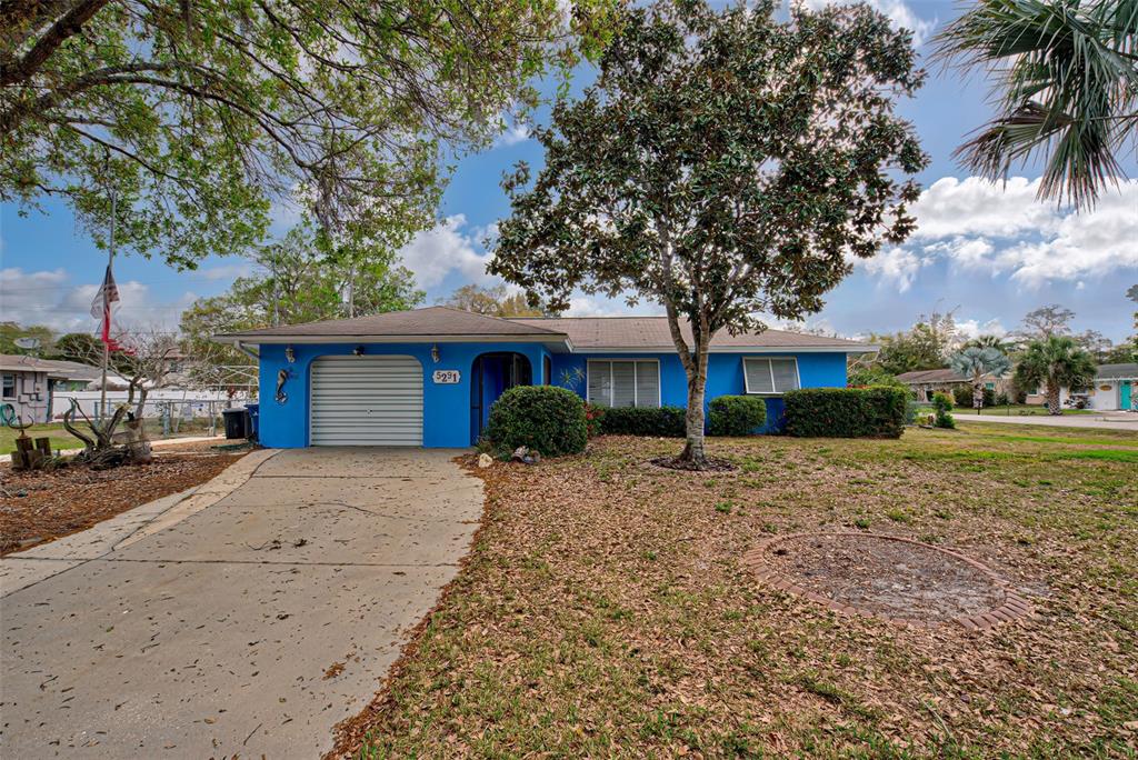 5291 Rolla Road Venice, FL 34293 - Photo 1 of 1 a front view of a house with a yard and garage