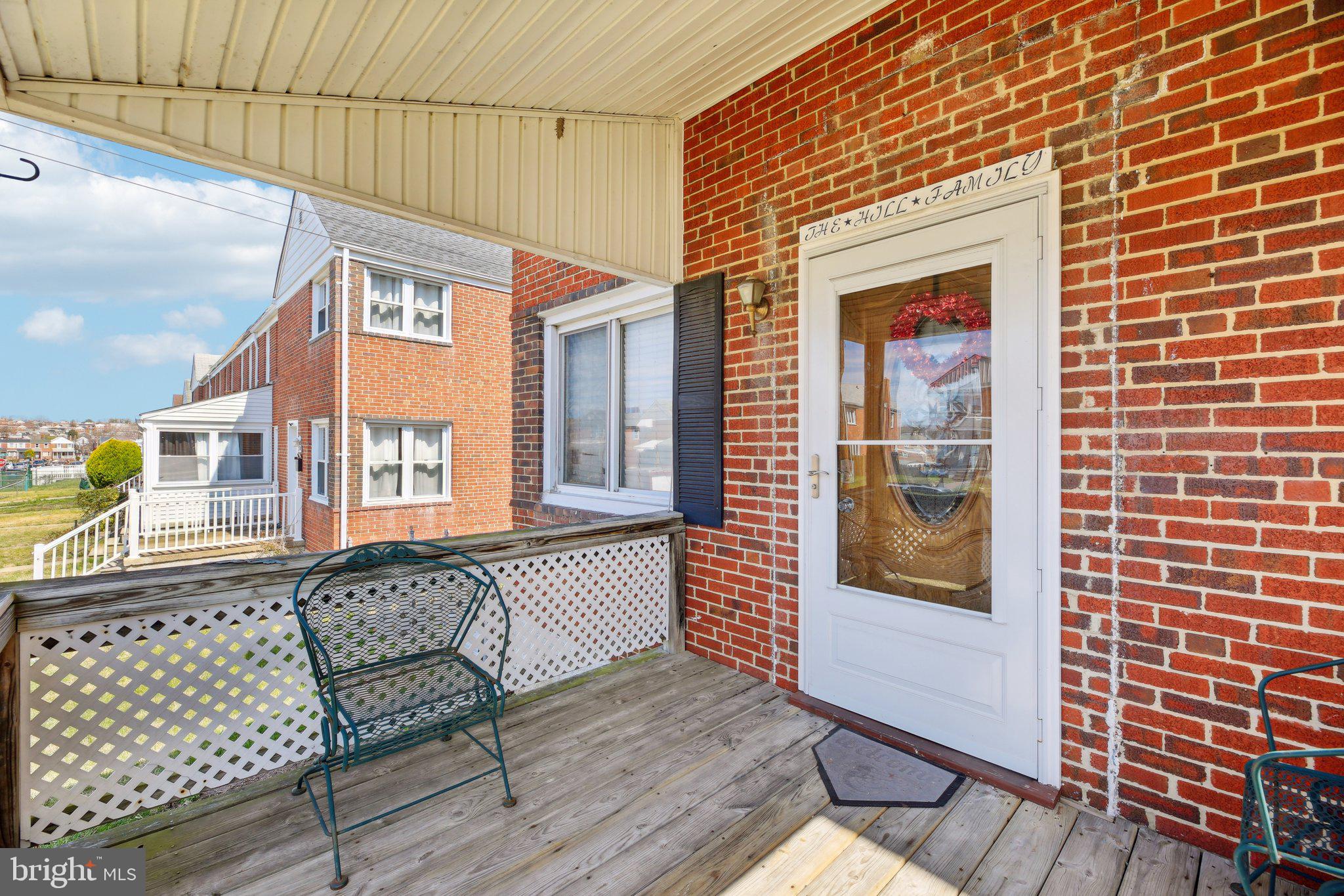 725 Aldworth Road Baltimore, MD 21222 - Photo 3 of 29 a view of a house with a bench