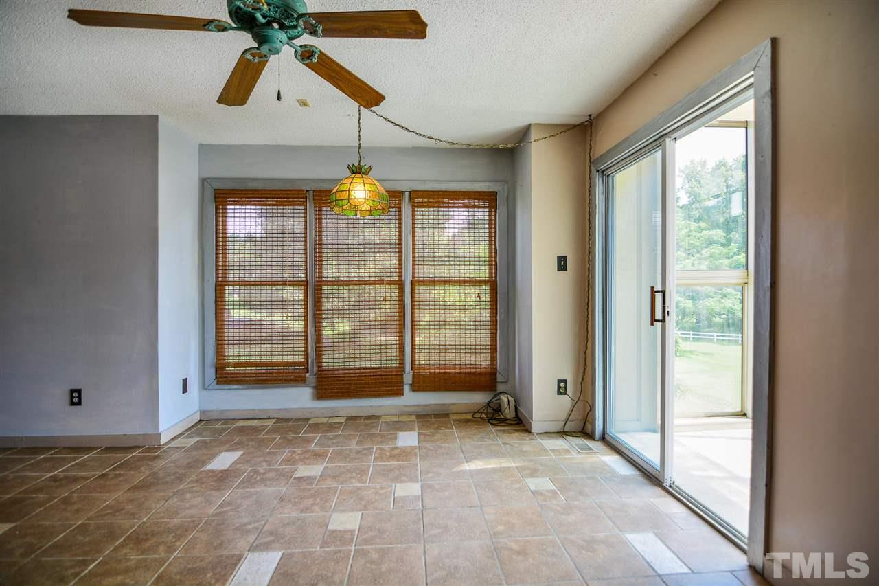 8235 Springhill Church Road Lucama, NC 27851 - Photo 18 of 30 a view of an empty room with a window