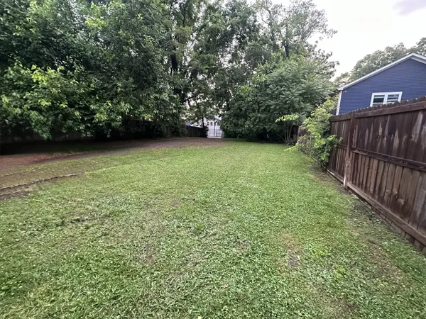 a view of outdoor space and yard