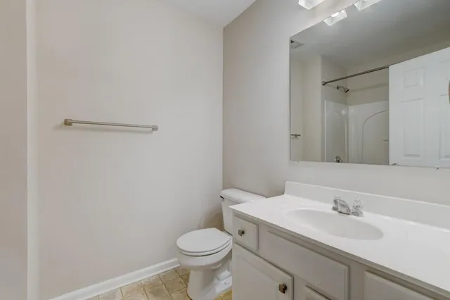 a bathroom with a sink and a toilet