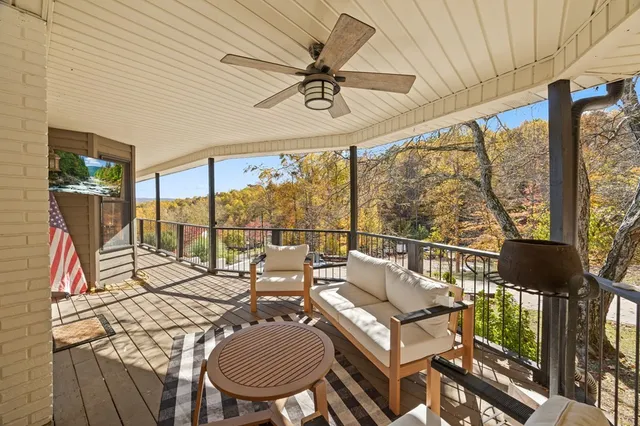 a living room with large windows
