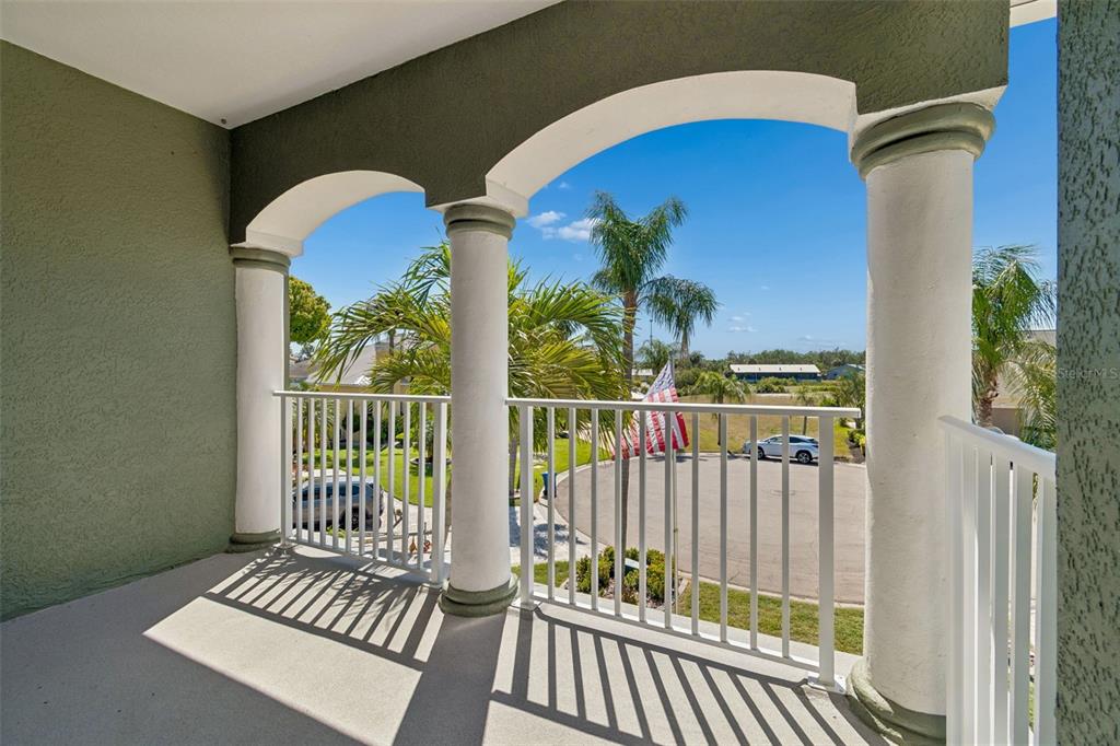 703 Bunker View Drive Apollo Beach, FL 33572 - Photo 32 of 49 a view of a balcony with wooden floor