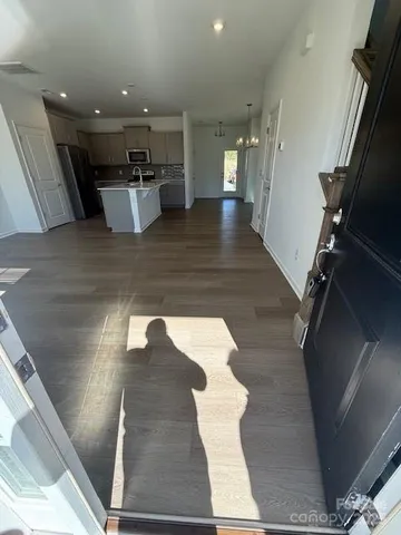 a view of a living room with a rug