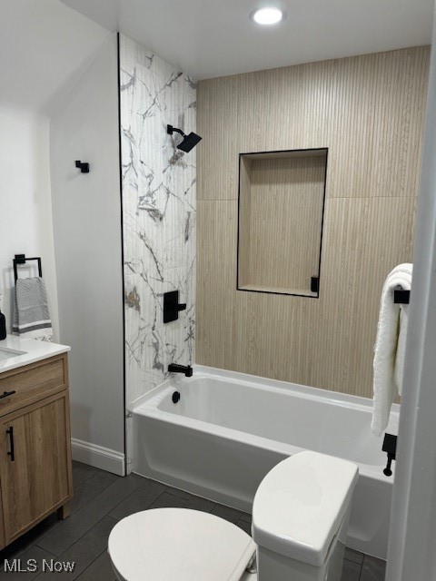 18210 Windward Road Cleveland, OH 44119 - Photo 16 of 40 Full bathroom featuring vanity, toilet, and shower / washtub combination