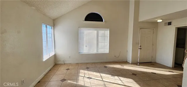 en empty room with windows