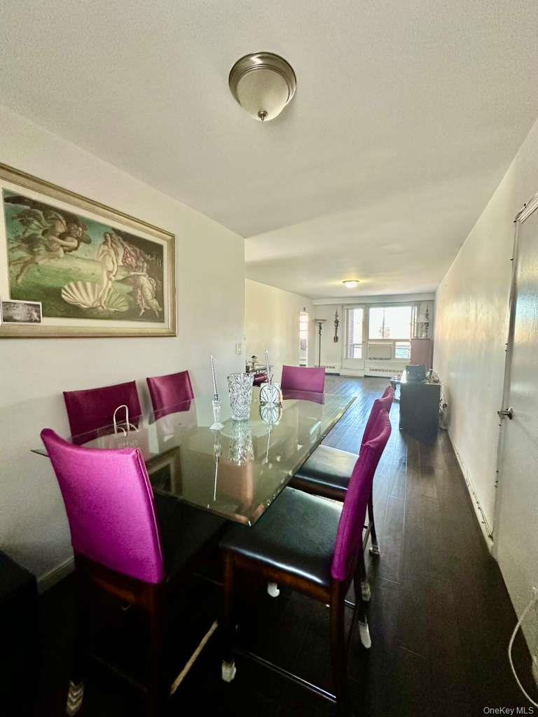 97-07 63rd Road, Unit 6H Queens, NY 11374 - Photo 11 of 17 a view of a dining room with furniture