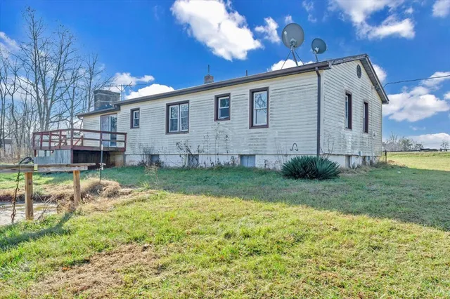 a house view with a swimming pool
