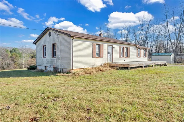 a house with yard in front of it