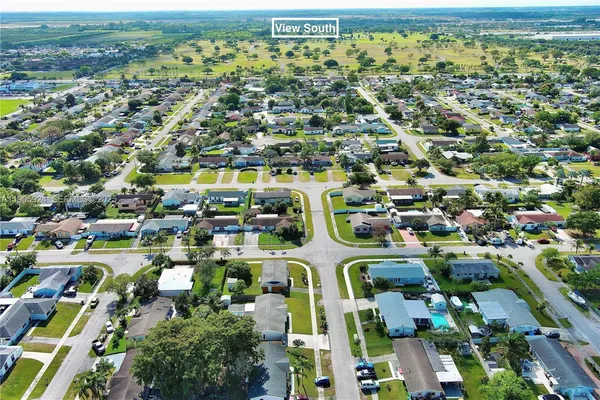 an aerial view of residential building and parking space