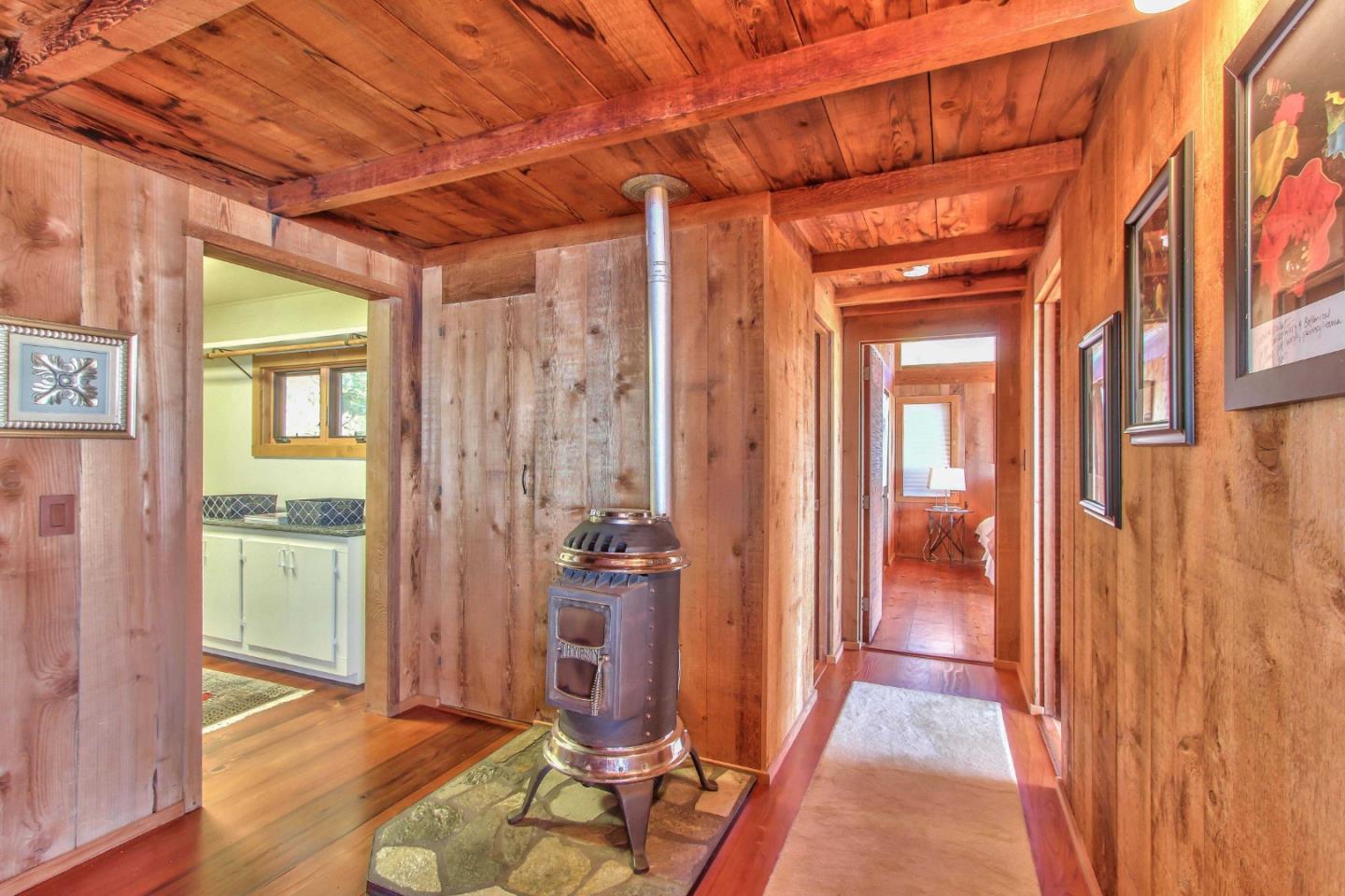 51410 Partington Ridge Road Big Sur, CA 93920 - Photo 14 of 45 a view of an entryway with wooden floor and a door