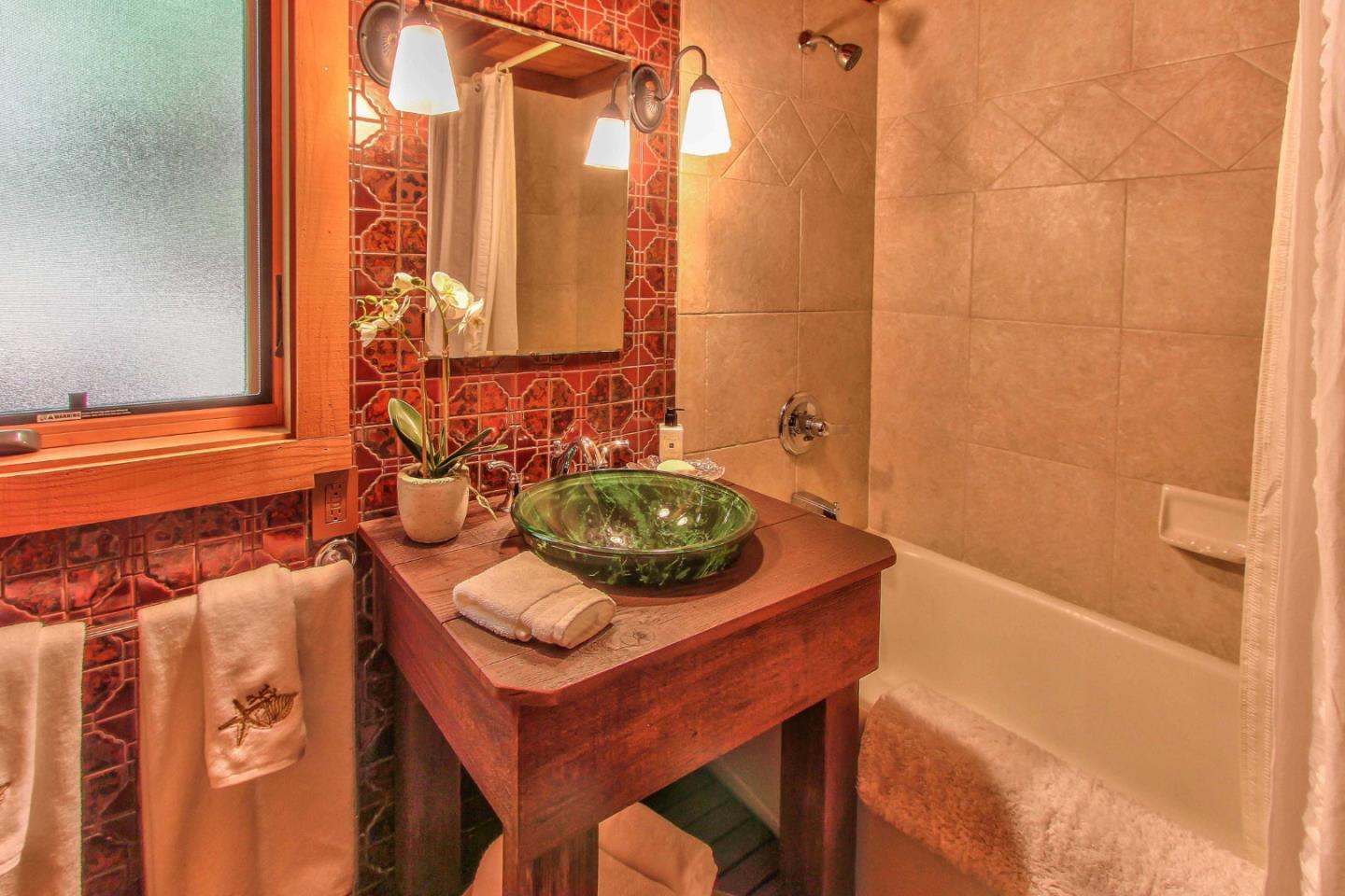 51410 Partington Ridge Road Big Sur, CA 93920 - Photo 17 of 45 a bathroom with a sink and a mirror