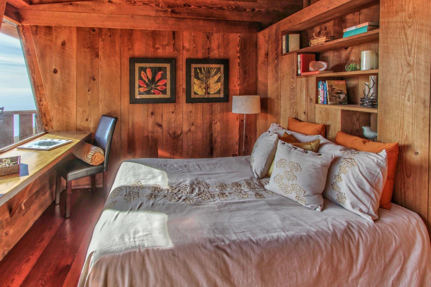 51410 Partington Ridge Road Big Sur, CA 93920 - Photo 18 of 45 a bedroom with a bed and furniture