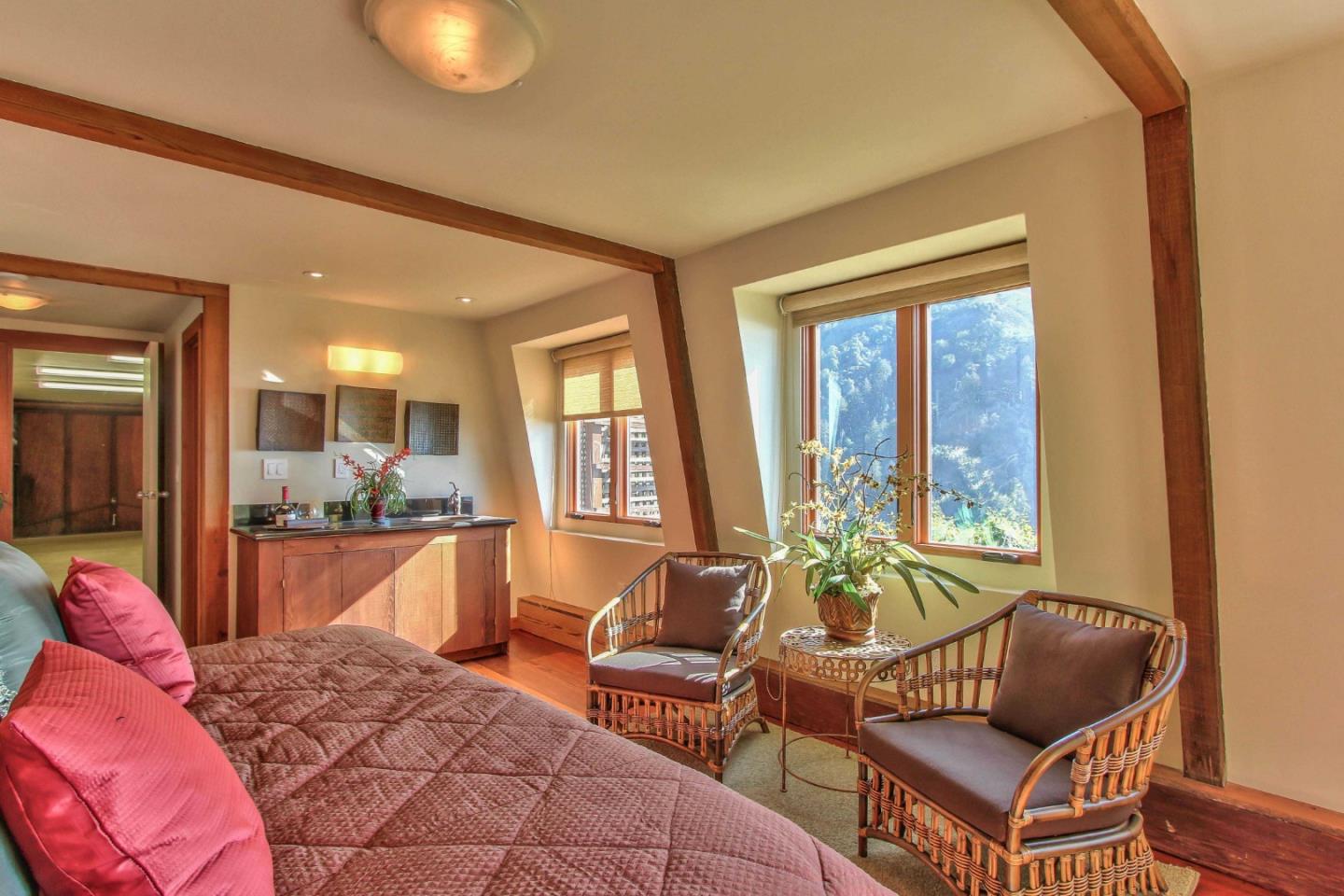 51410 Partington Ridge Road Big Sur, CA 93920 - Photo 25 of 45 a living room with furniture and a large window