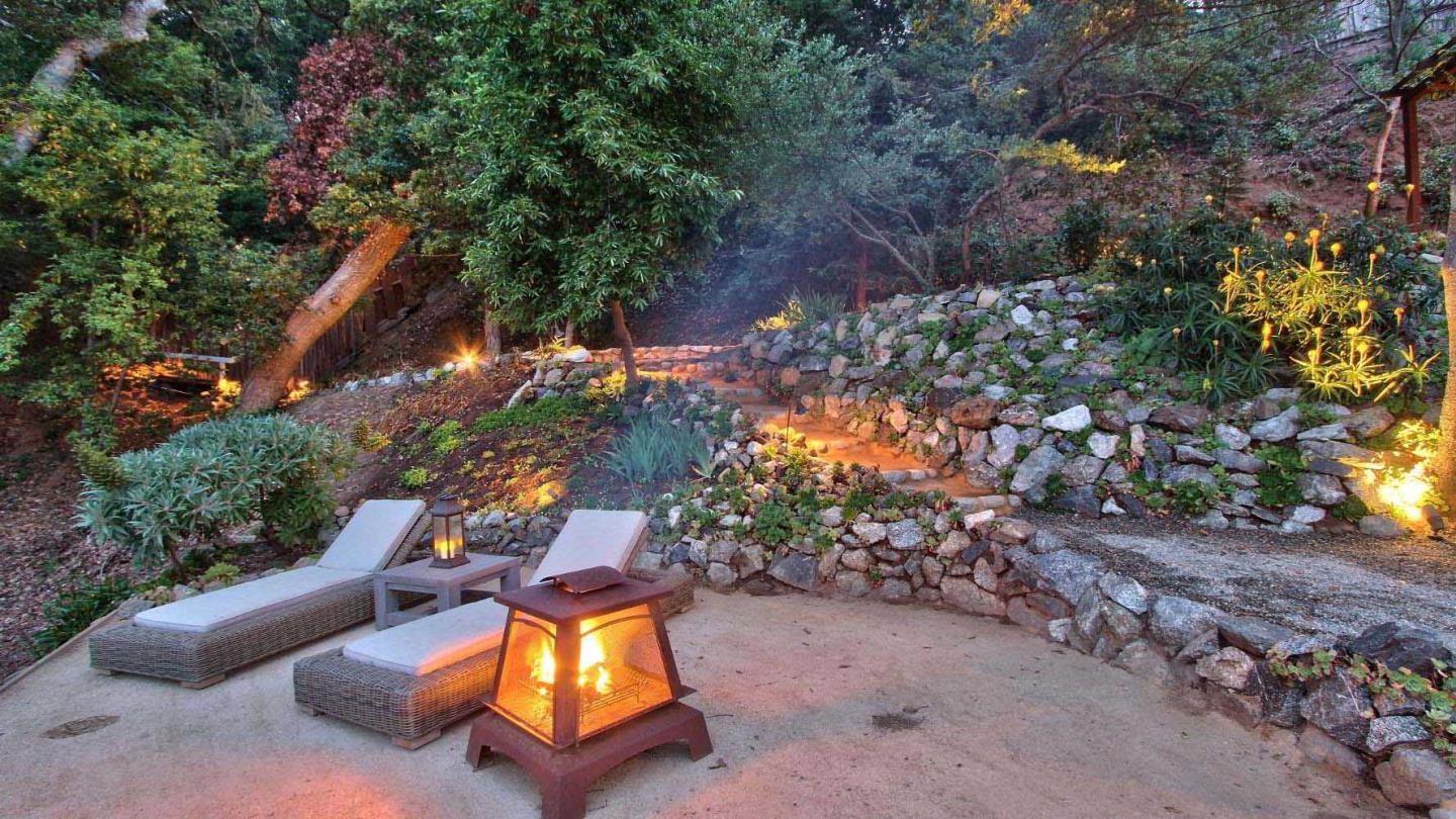 51410 Partington Ridge Road Big Sur, CA 93920 - Photo 33 of 45 a view of a backyard with swimming pool