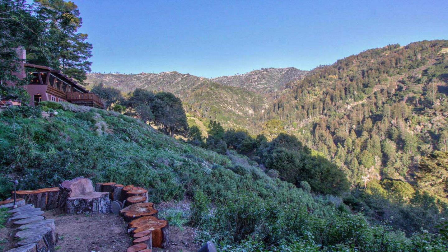 51410 Partington Ridge Road Big Sur, CA 93920 - Photo 38 of 45 a view of a large building with a mountain in the background