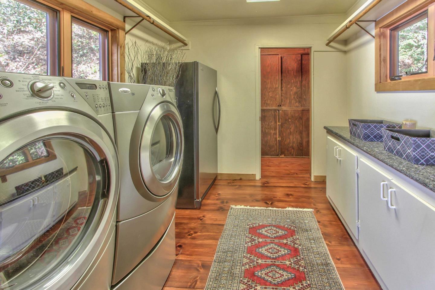 51410 Partington Ridge Road Big Sur, CA 93920 - Photo 45 of 45 a bathroom with a sink and a mirror