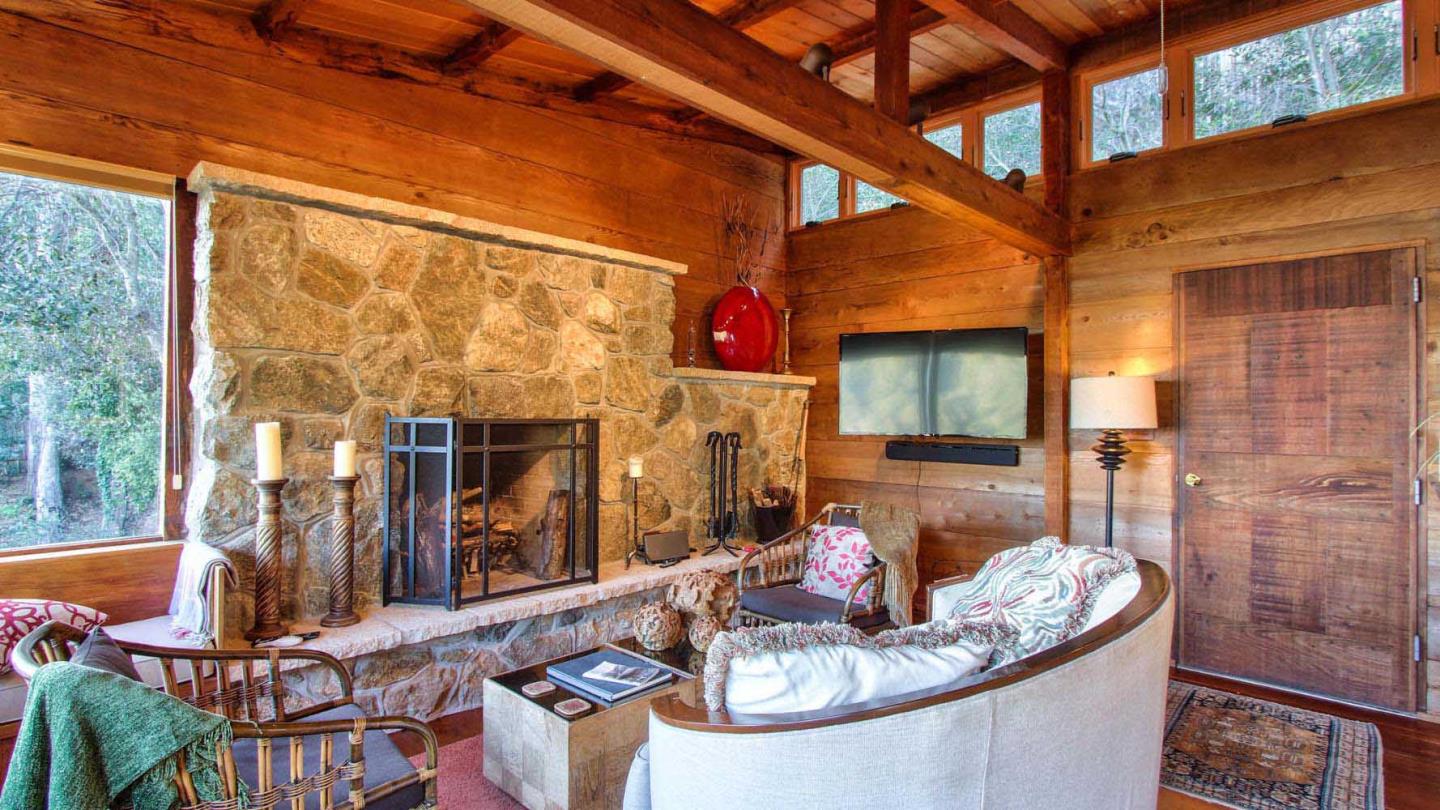 51410 Partington Ridge Road Big Sur, CA 93920 - Photo 6 of 45 a building outdoor space with patio furniture and potted plants