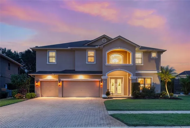 a view of a swimming pool with a patio