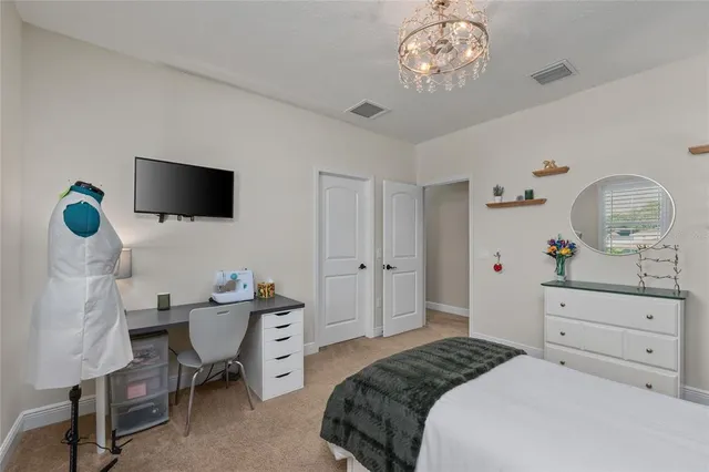 a house view with a clock tower in middle of a yard