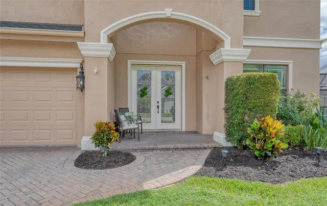 a view of a livingroom with furniture and a kitchen
