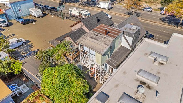 an aerial view of a house with a garden