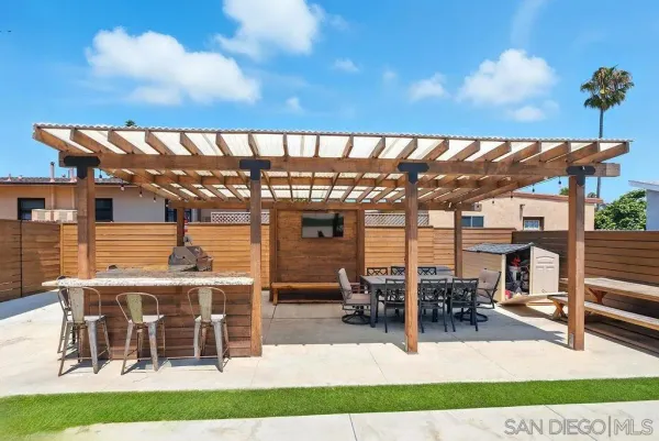 a view of a patio with swimming pool