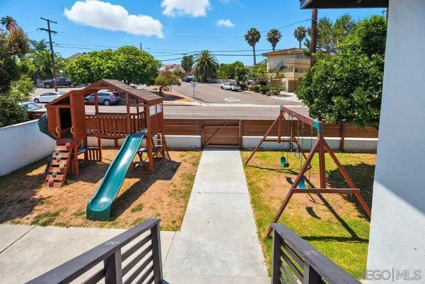 a view of a swimming pool with a patio