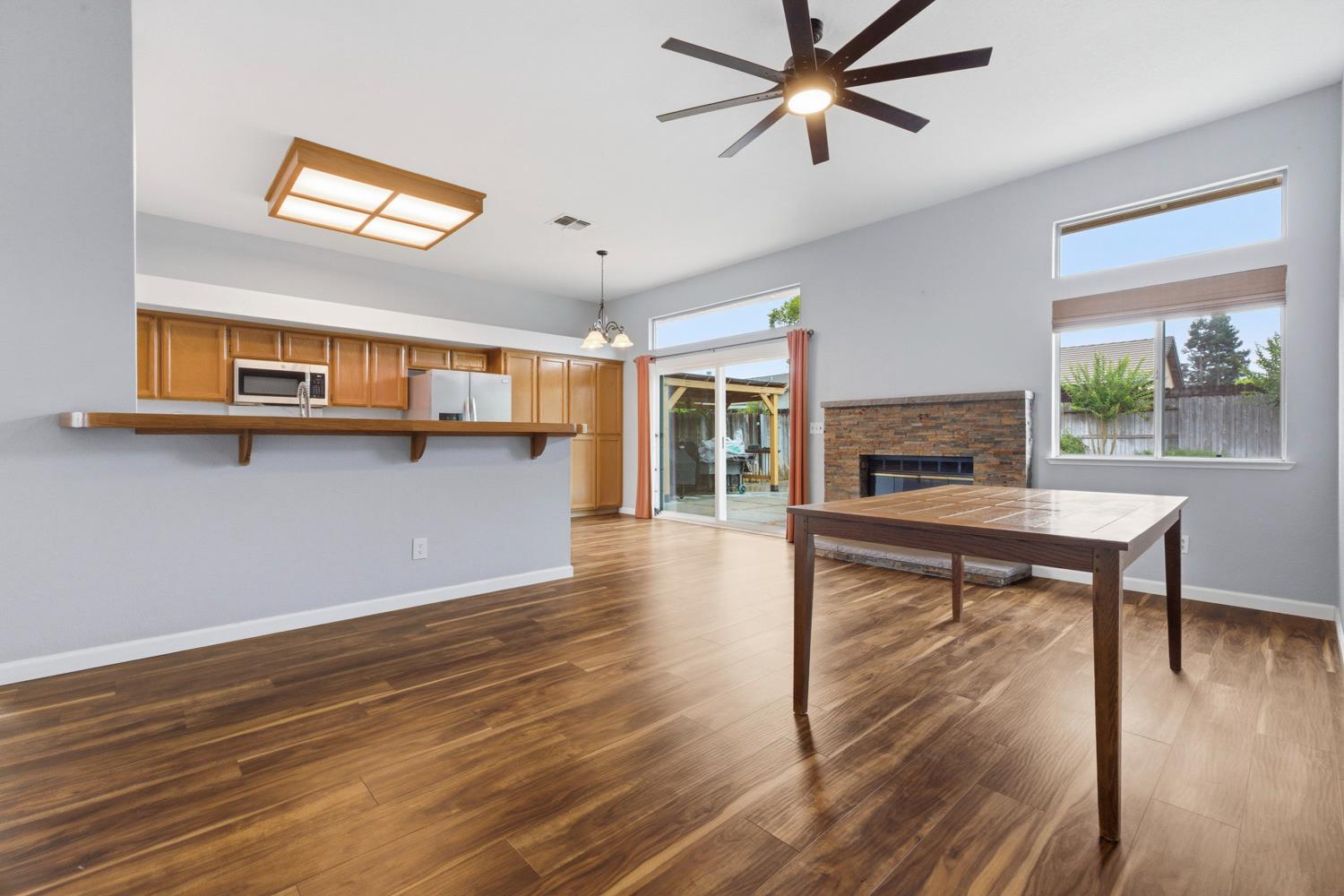 969 Colson Way Galt, CA 95632 - Photo 18 of 38 a living room with furniture and a kitchen view