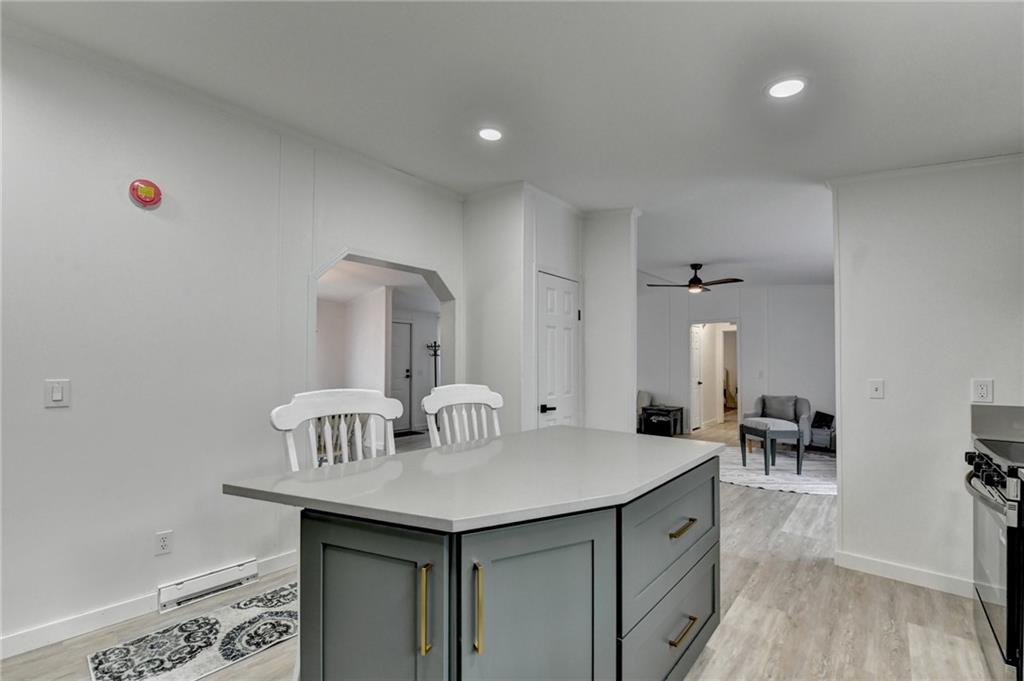 85 Betts Mine Road Dawsonville, GA 30534 - Photo 11 of 18 a view of living room with granite countertop furniture and wooden floor