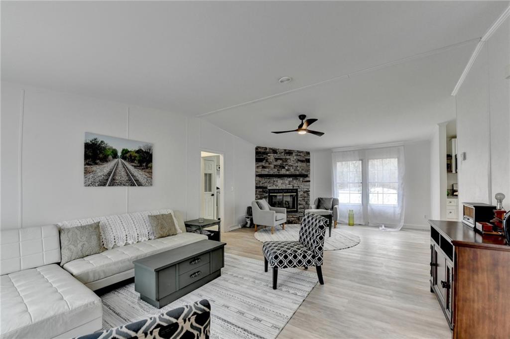 85 Betts Mine Road Dawsonville, GA 30534 - Photo 14 of 18 a living room with furniture and wooden floor