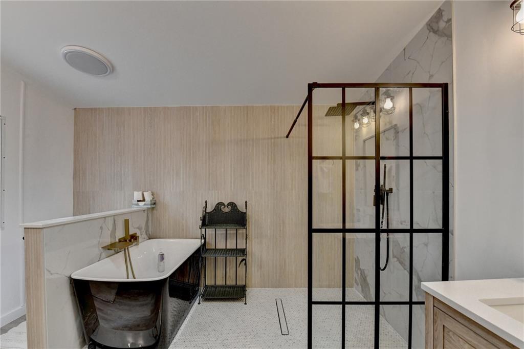 85 Betts Mine Road Dawsonville, GA 30534 - Photo 2 of 18 a bathroom with a sink and mirror