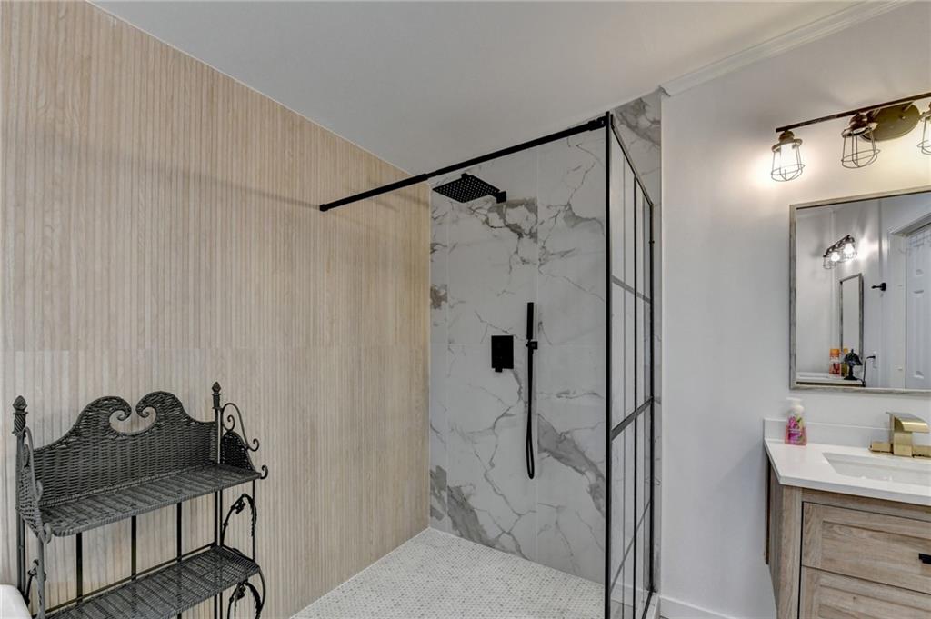 85 Betts Mine Road Dawsonville, GA 30534 - Photo 5 of 18 a bathroom with a bathtub and shower