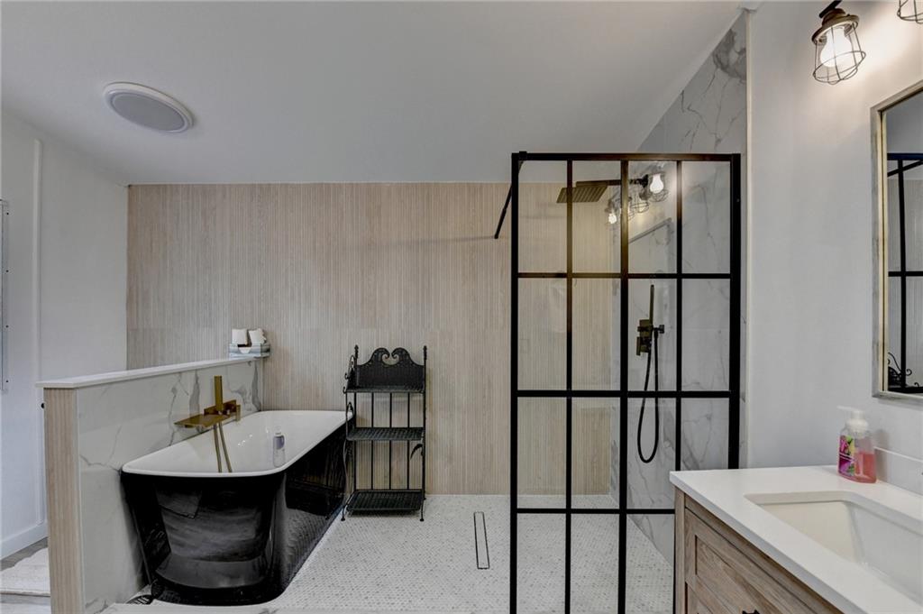 85 Betts Mine Road Dawsonville, GA 30534 - Photo 6 of 18 a bathroom with a sink and a mirror